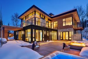 Snowmass Contemporary Dusk Exterior Rear with hot tub