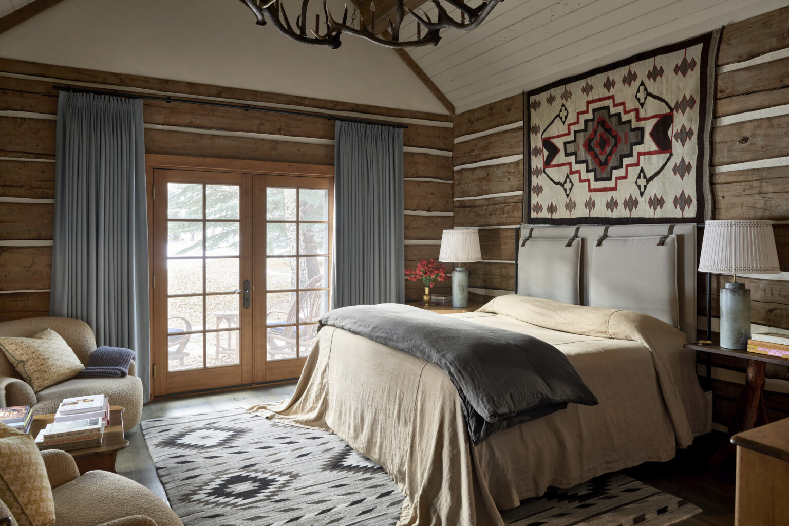 The interiors on the charming cabin are sophisticated and moody. Aspen architectural photographer Dallas + Harris photographed this project for Kathy Kroger Interiors.