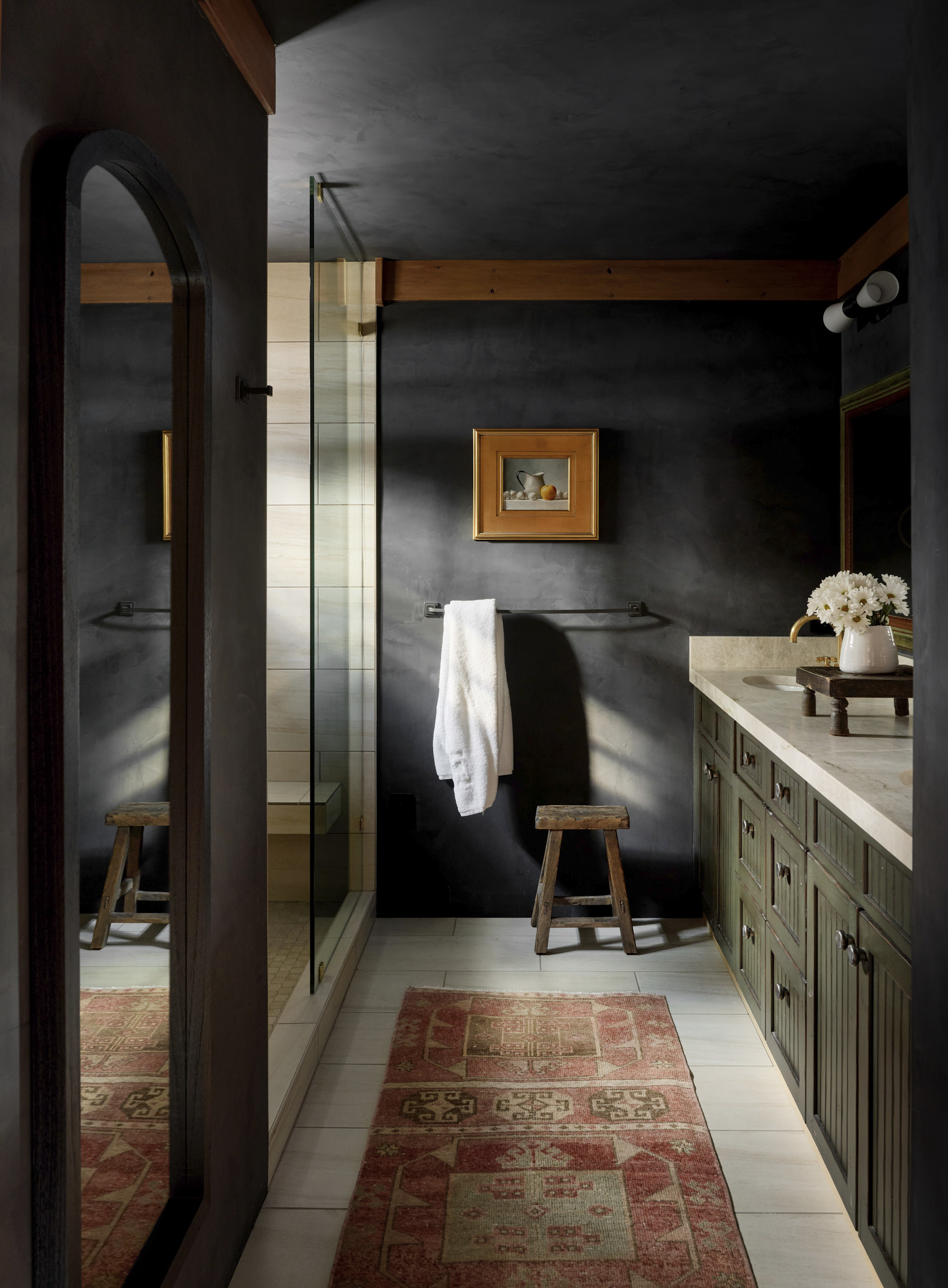 The interiors on the charming cabin are sophisticated and moody. Aspen architectural photographer Dallas + Harris photographed this project for Kathy Kroger Interiors.